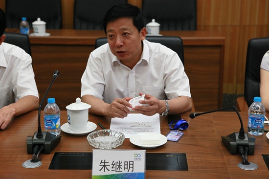 朱继明总助会见武汉市委组织部副部长朱库成